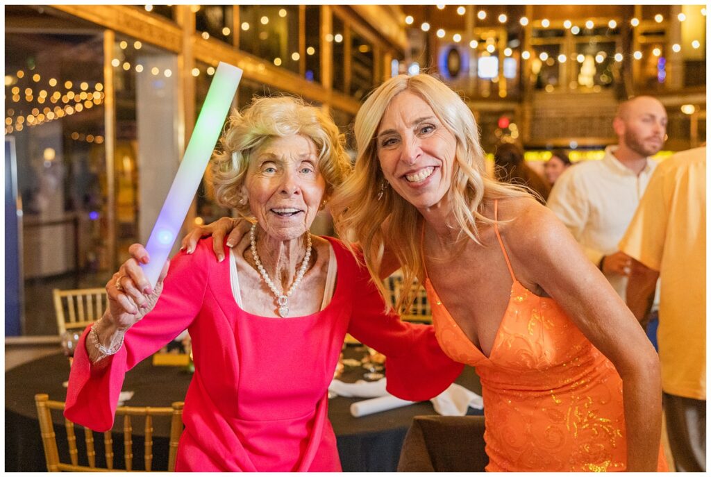 bride's mom posing with the grandmother on the dance floor in Cleveland, OH