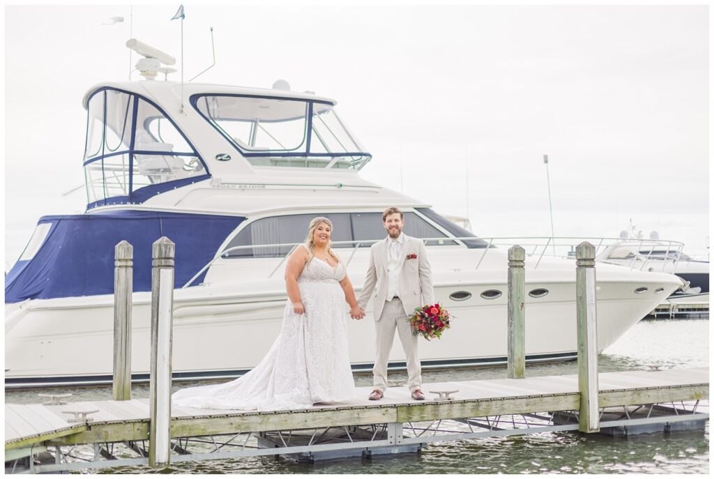 Sandusky, Ohio bride and groom portraits next to the boats at the yacht club