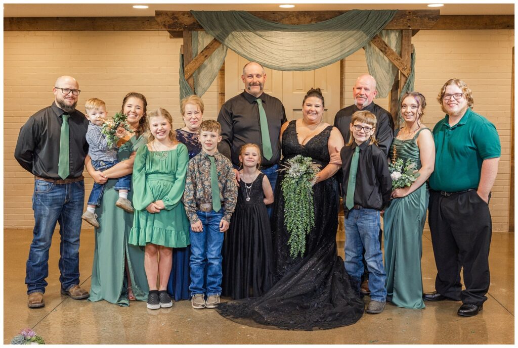 family portraits with the bride and groom inside the chapel at Pickwick Place