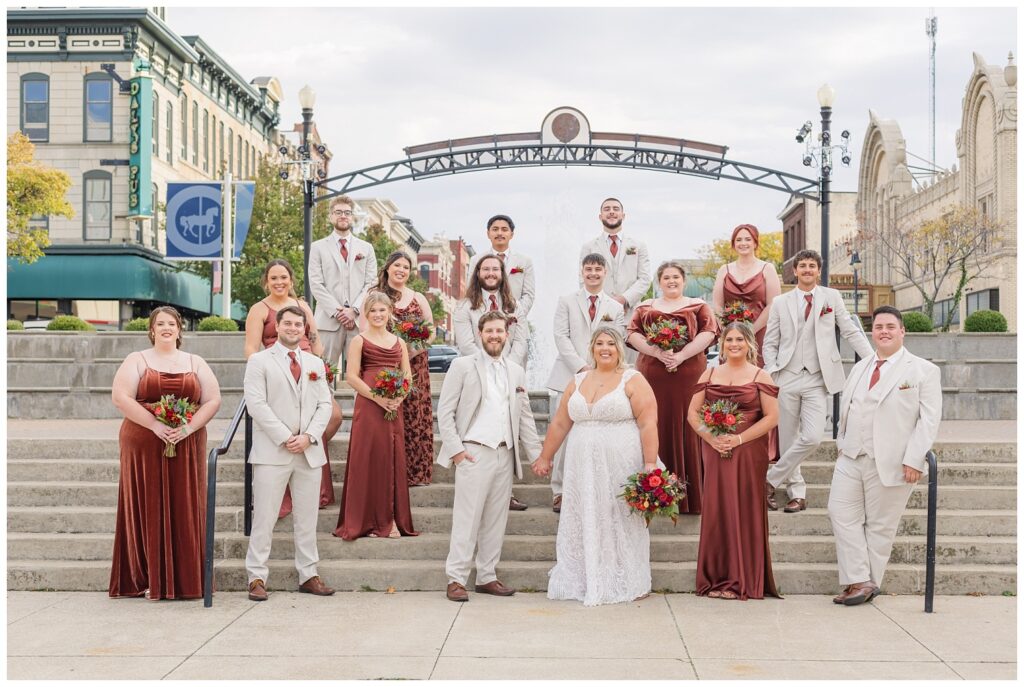 full wedding party standing on the stairs in downtown Sandusky, Ohio