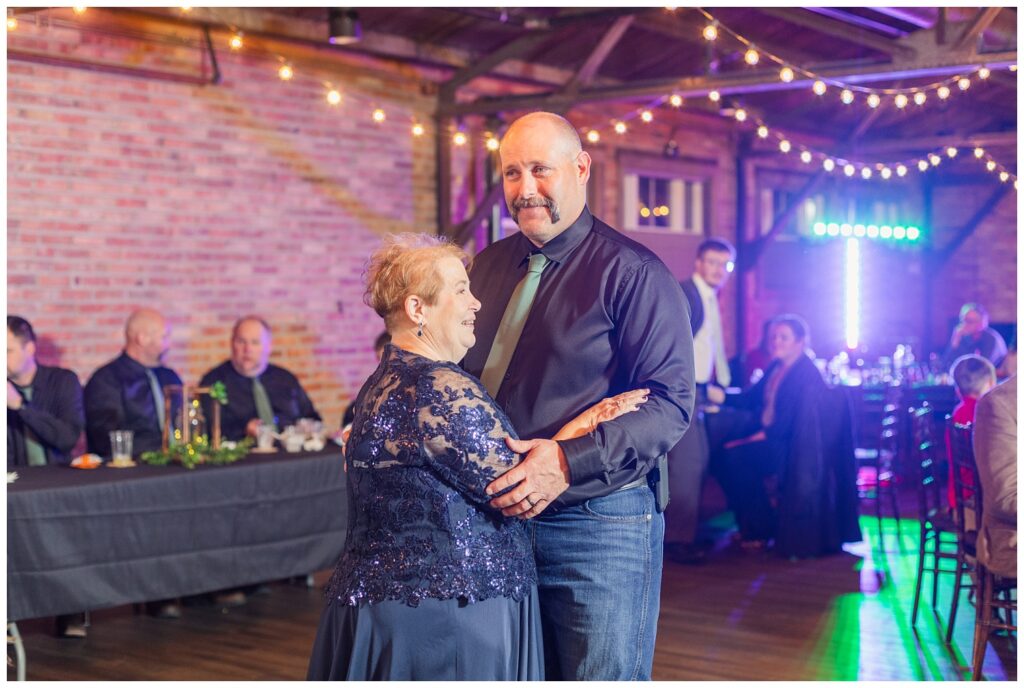 groom dancing with the bride's mom at fall wedding reception in Bucyrus, Ohio