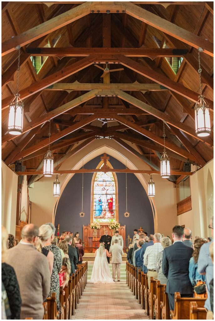 bride and her dad at the altar at the start of the church ceremony in Sandusky