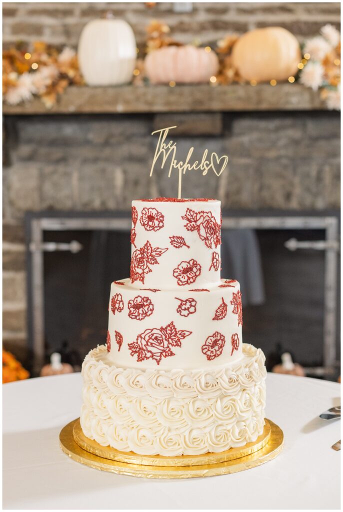 red and ivory three tiered cake at Sandusky Yacht Club reception