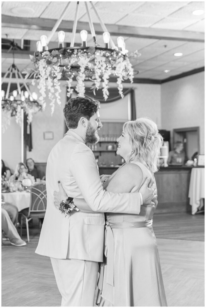 groom dancing with his mom during fall reception in Sandusky 