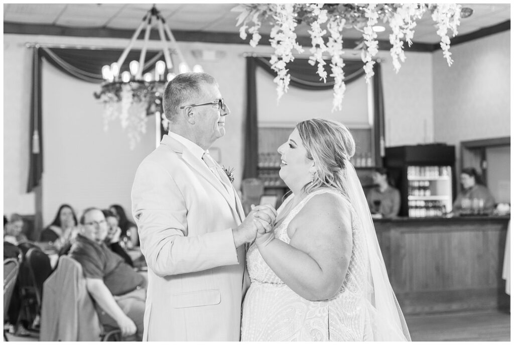 bride and her dad dancing at the fall reception at yacht club in Sandusky