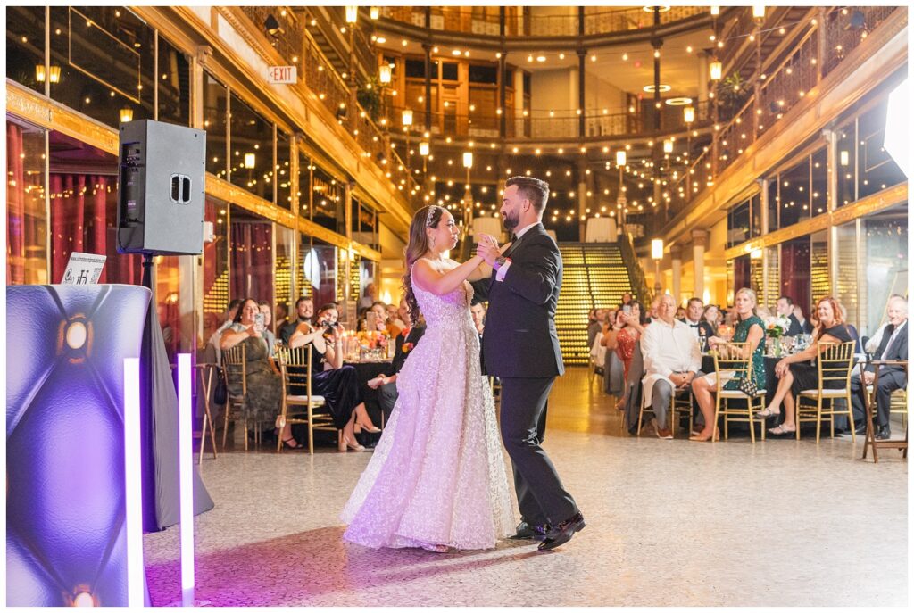 wedding couple having first dance on the bottom floor of the Arcade Cleveland