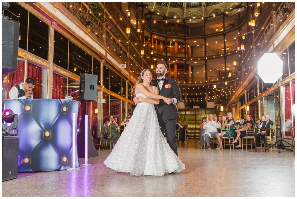 wedding couple spinning on the floor during fall reception at Cleveland venue