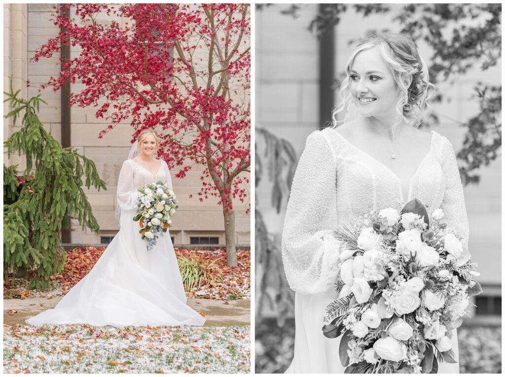 bride posing in front of the church and a large red tree before the ceremony