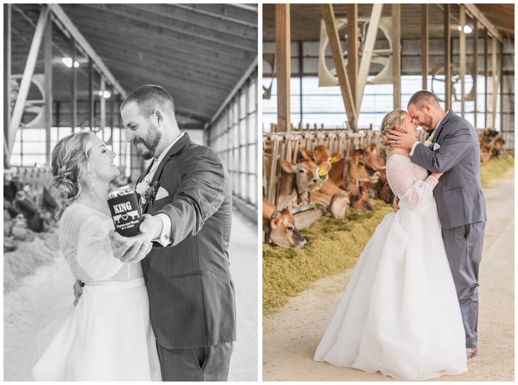 wedding couple holding out their koozie while standing inside the cow barn