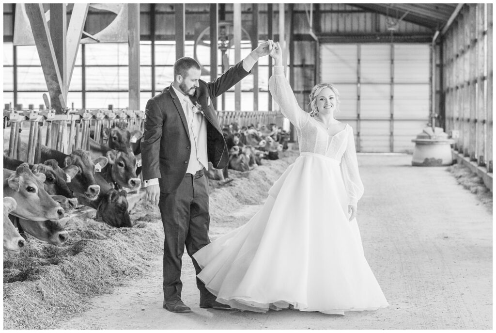 wedding couple twirling at the groom's family farm in Fremont, Ohio