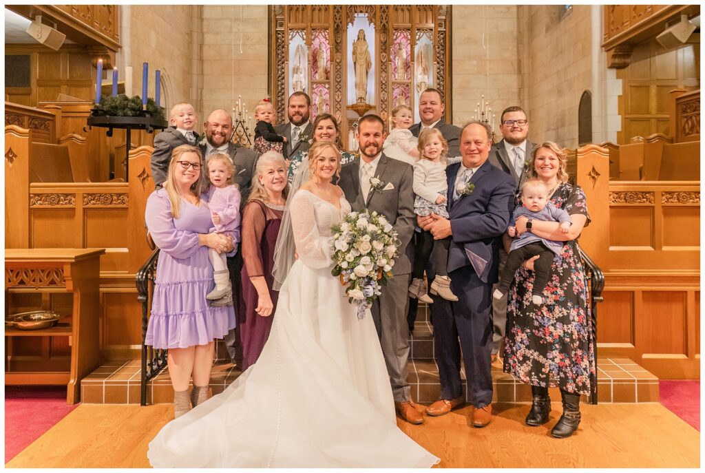 large group family portrait in front of the church altar in Fremont, Ohio