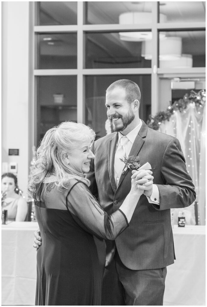 groom dancing with his mom at winter wedding reception in Fremont, Ohio