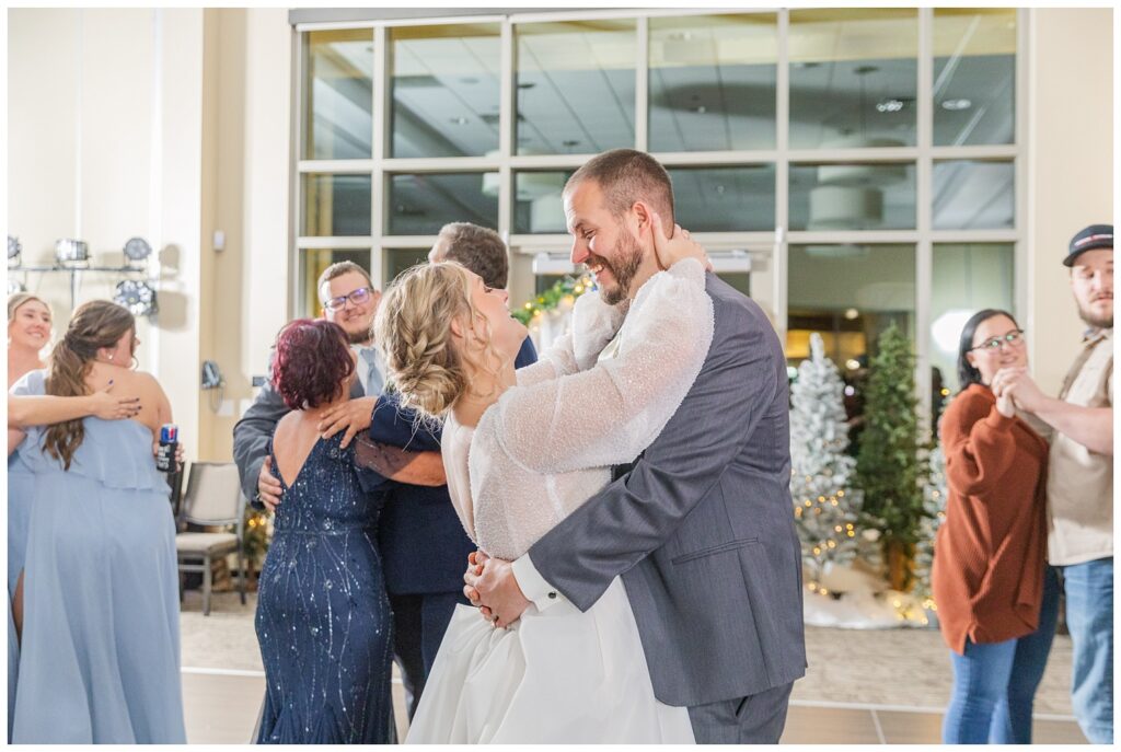 bride and groom dancing with the other wedding guests in Fremont, Ohio