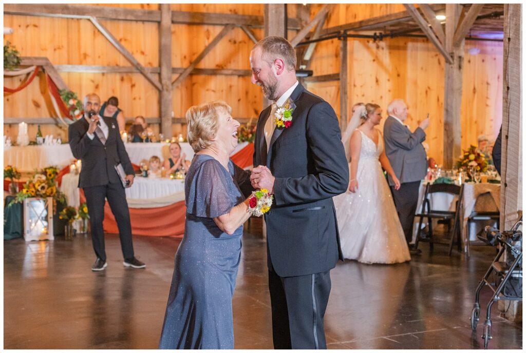 groom dancing with his mom at fall wedding reception in Monroeville, OH