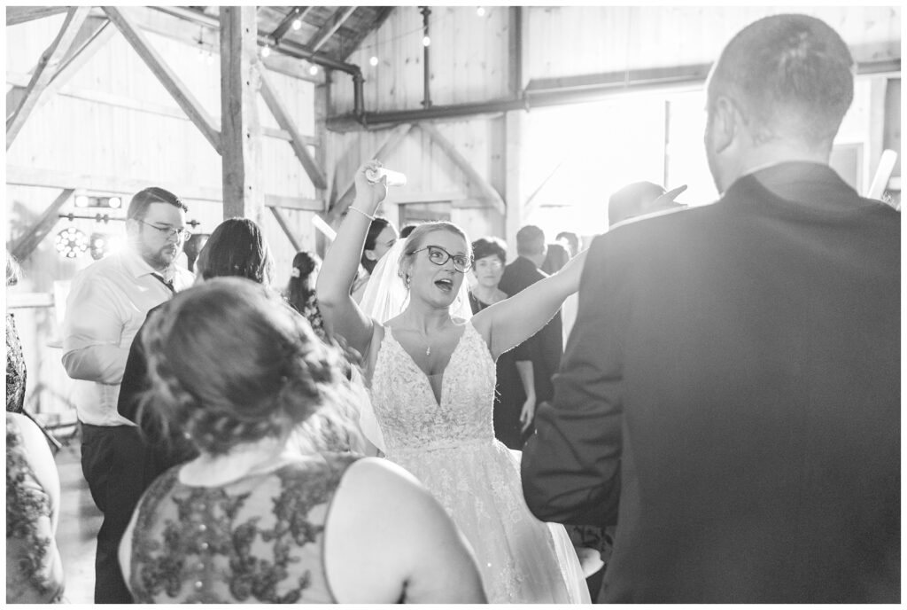 bride dancing with her wedding guests at the reception venue in Monroeville, OH