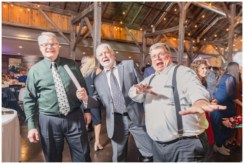 bride's dad and his friends dancing at Monroeville, OH reception venue