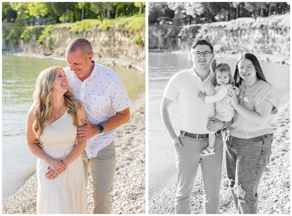 couple smiling and holding their daughter on the beach at South Bass Island