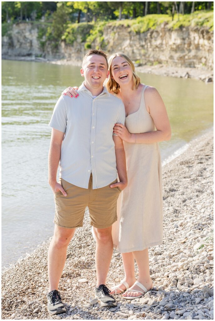 couple smiling together while standing on the shore on South Bass Island