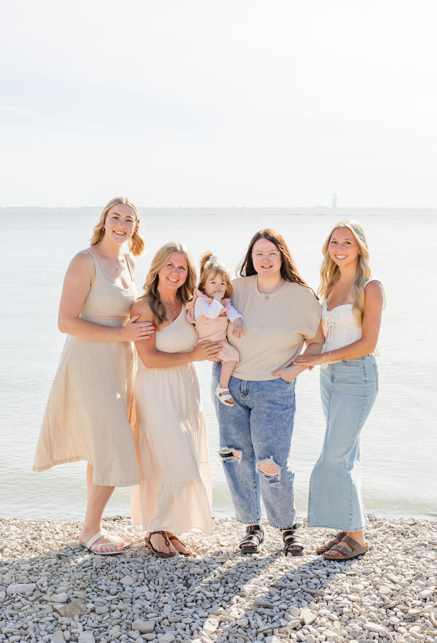 family posing on the beach at South Bass Island in Ohio