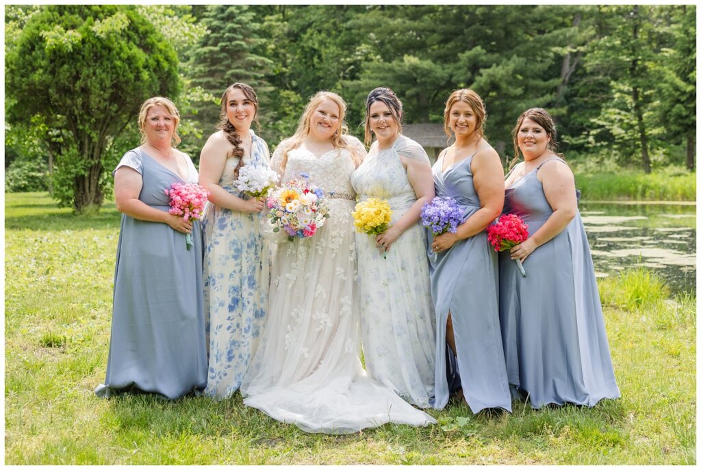 bridal party portraits near the pond with Bradner Preserve wedding photographer