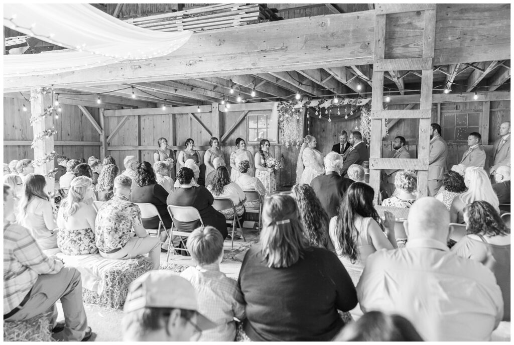 wedding couple sharing their vows at barn ceremony in Risingsun, Ohio