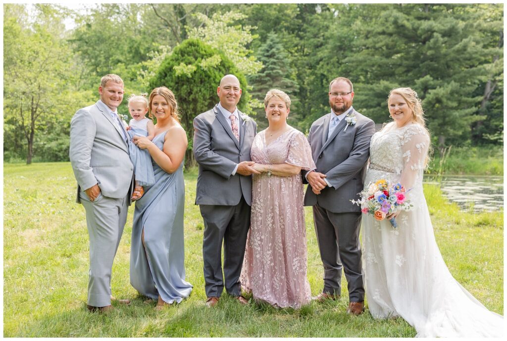 wedding family portraits at Bradner Preserve in Ohio near the pond
