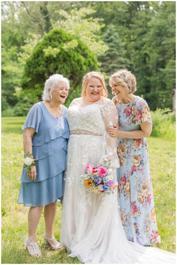 bride posing with her mom and grandmother at Bradner Preserve
