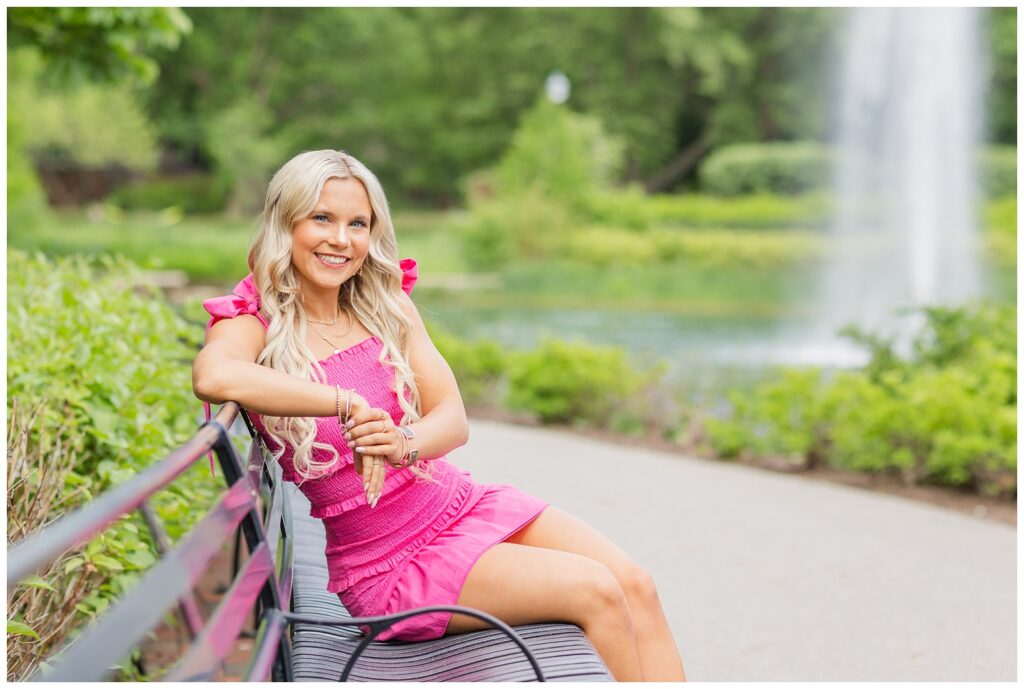 senior girl posing on a bench next to a lake at Columbus, Ohio session