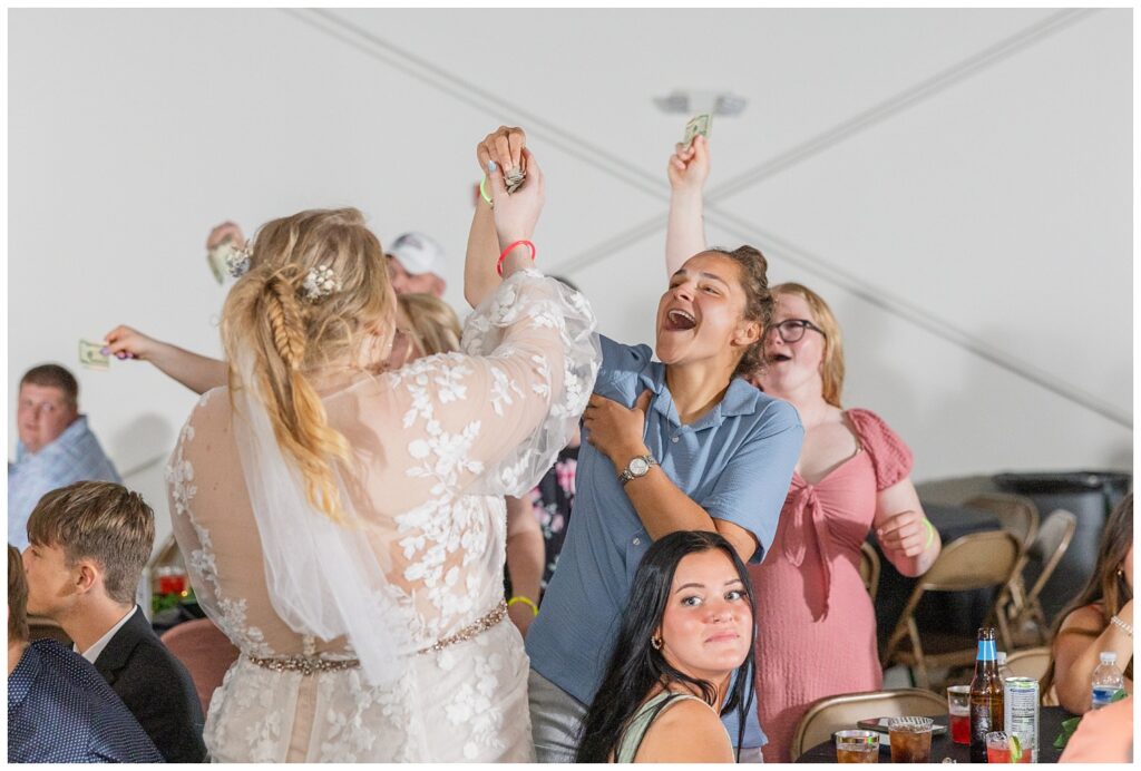bride and her friends dancing at summer wedding reception in Fostoria, Ohio