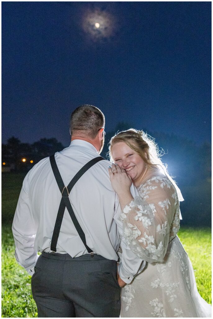 couples portraits under the moon at Fostoria, Ohio reception venue