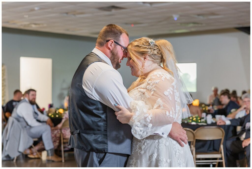 wedding couple share their first dance at Stacy's Place reception venue in Fostoria