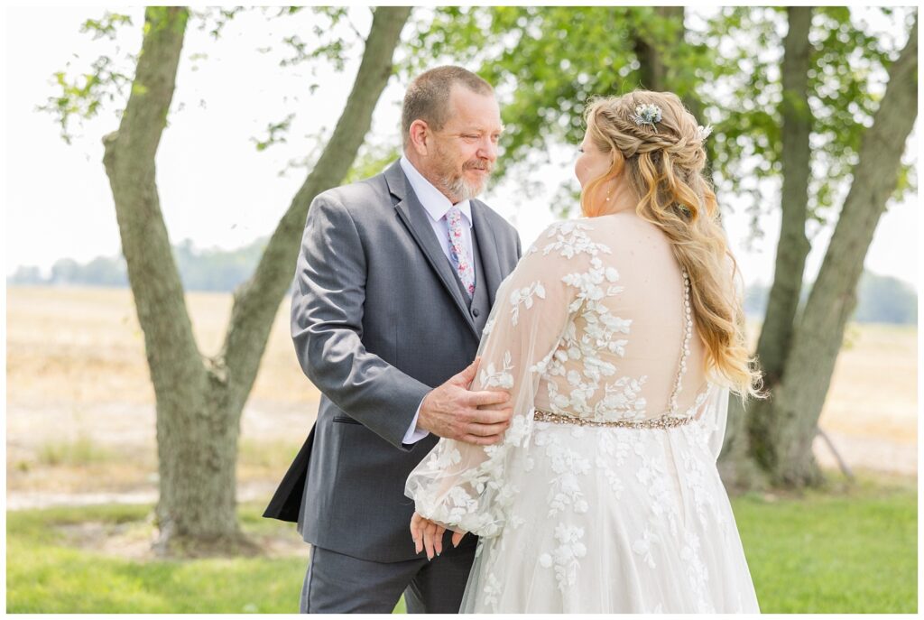 dad smiling at his daughter the bride at Fostoria, Ohio wedding