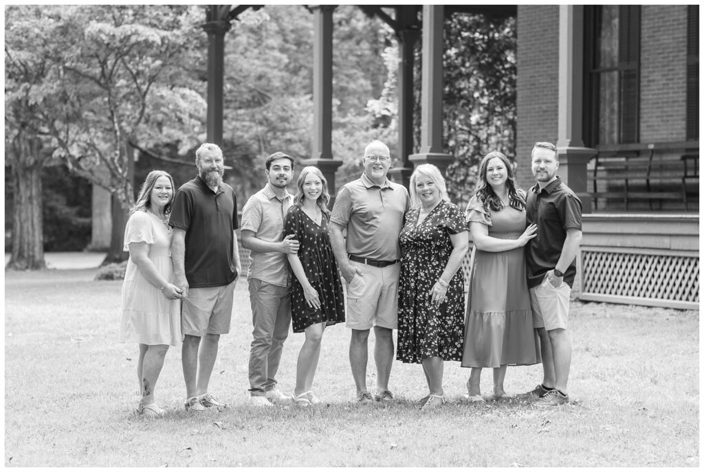extended family posing in front of the president's house at the Hayes Center in Fremont, Ohio