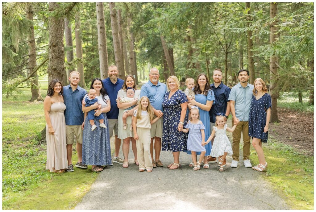 all members of an extended family posing for a session with Fremont, Ohio photographer at Hayes Center