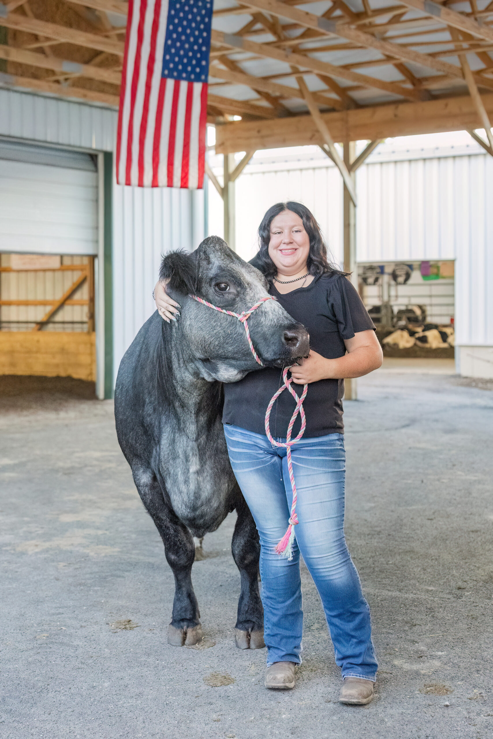 high school senior holding her cow at Sandusky, Ohio fair