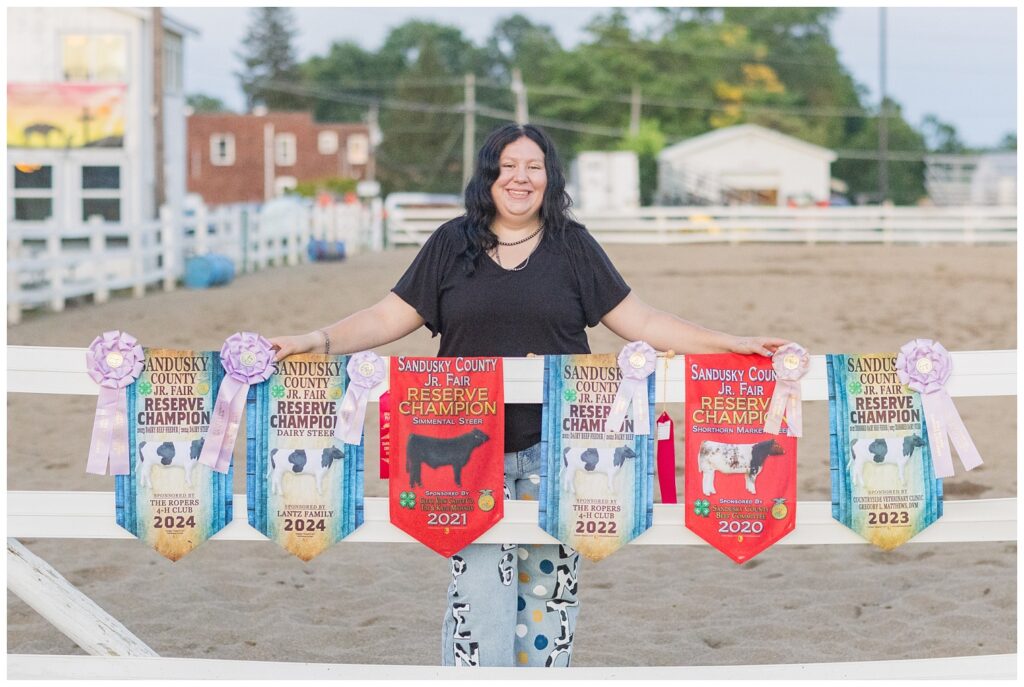 girl showing off her 4-H awards at the Sandusky, Ohio county fair for senior session