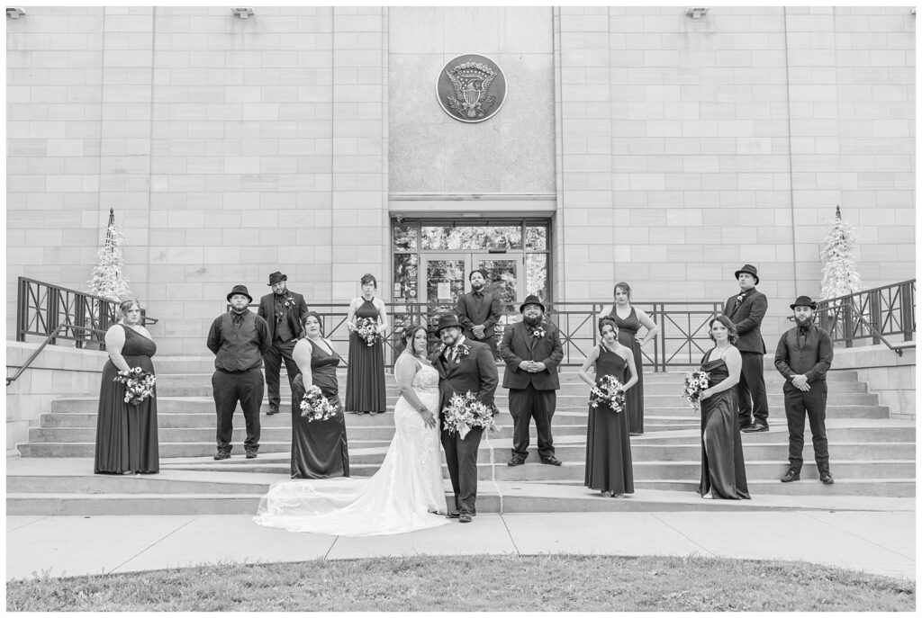 full wedding party posing alone on the ramps at the Hayes Center in Fremont, Ohio