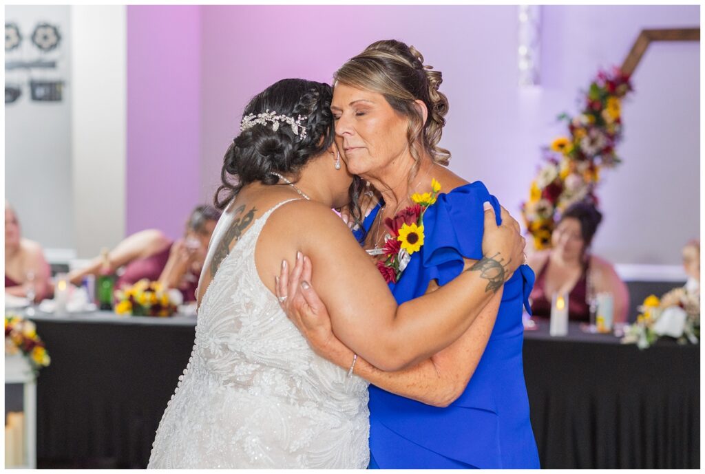 bride dancing with her mom during wedding reception at Fremont, Ohio venue