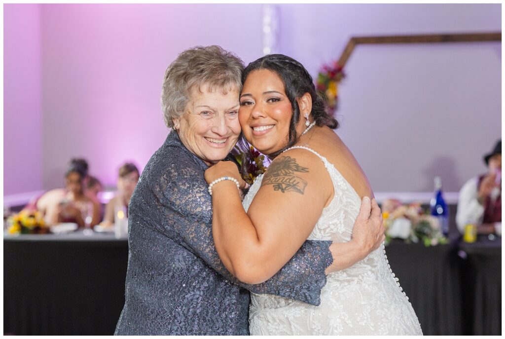 bride dancing with her grandmother during fall wedding reception at the Victor's Center