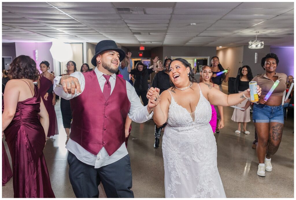 bride and groom dancing together on the floor at Fremont, Ohio wedding reception