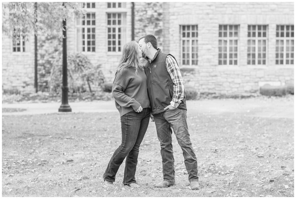 couple sharing a kiss at Heidelberg University engagement session with Tiffin, Ohio photographer