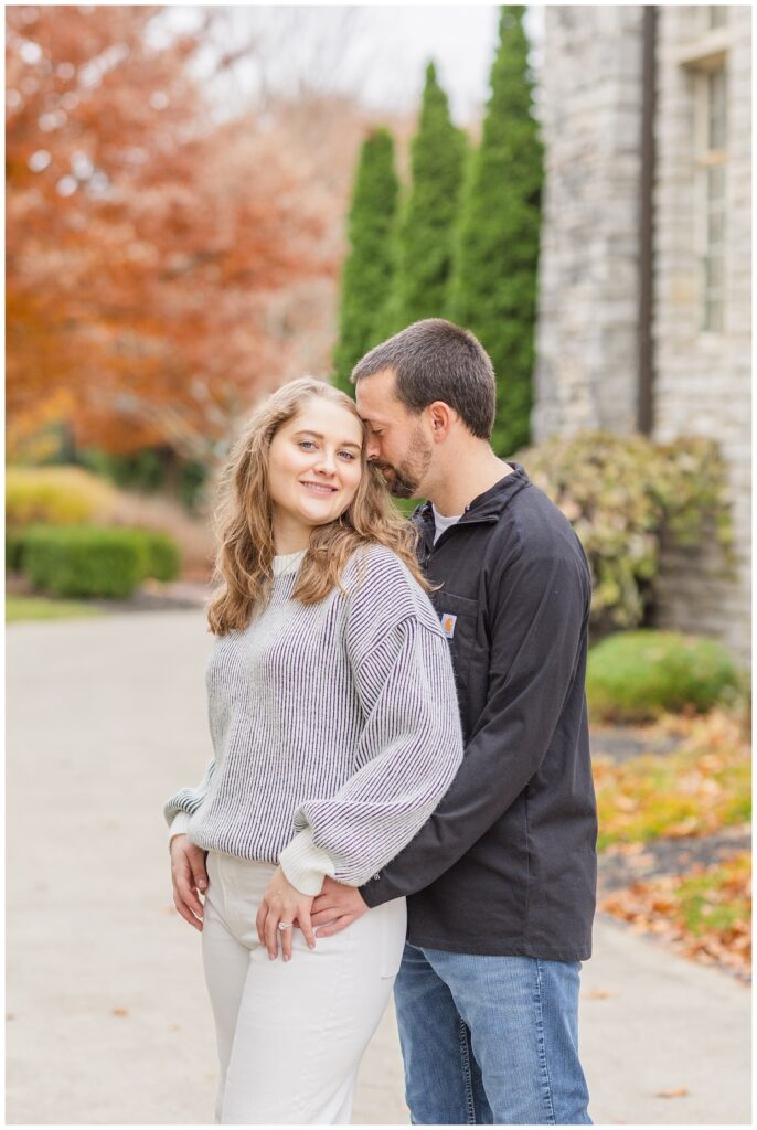couple posing on a sidewalk for Heidelberg University engagement session