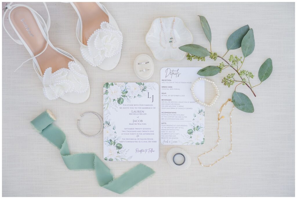 wedding flat lay with bridal details at Tiffin, Ohio venue