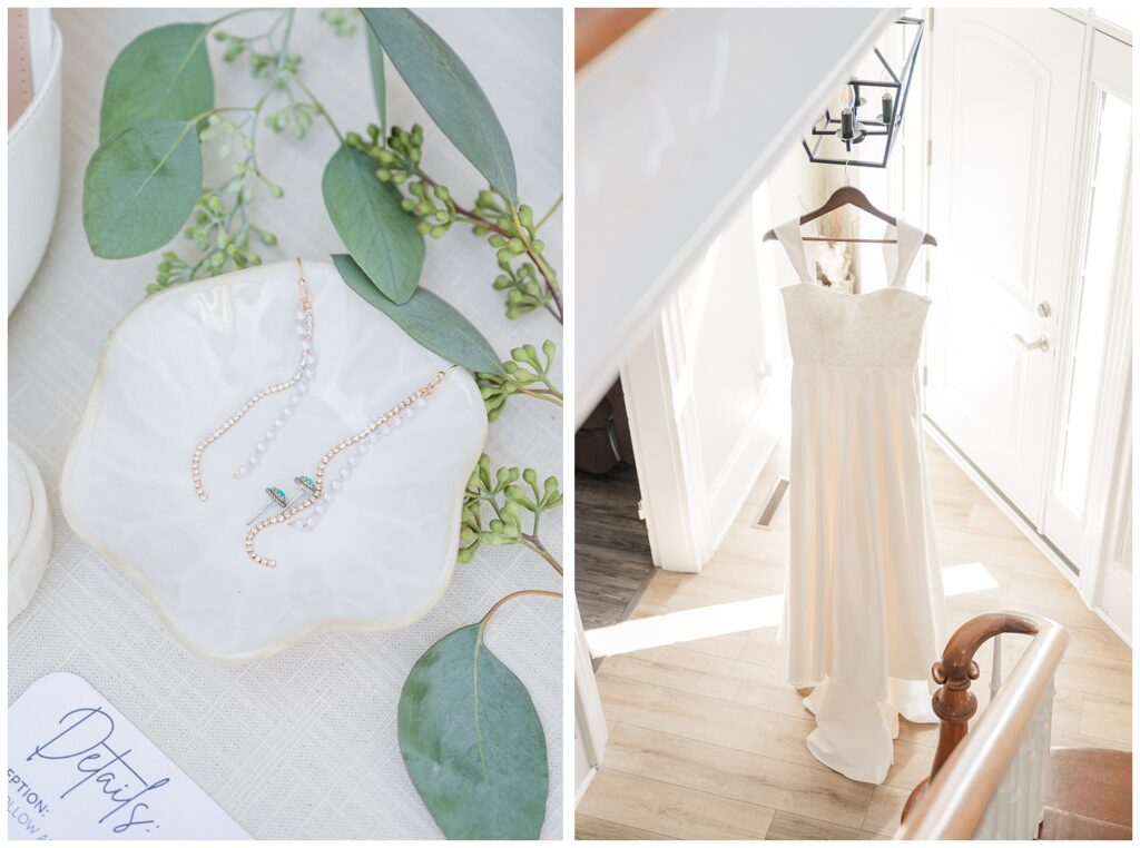 wedding dress hanging from a black lighting fixture in the foyer of the venue
