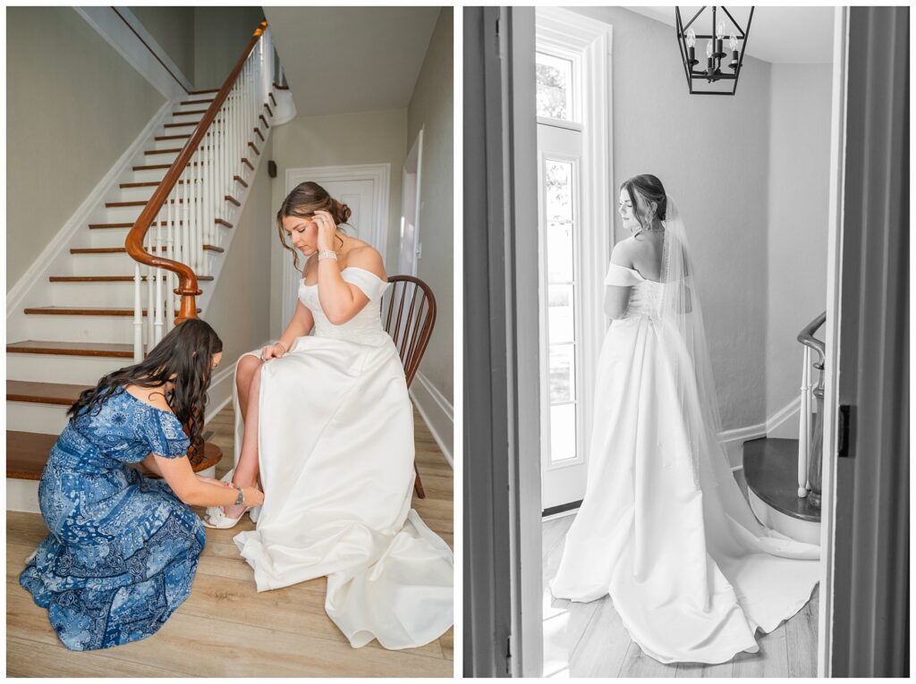 maid of honor helping the bride put on her shoes in the foyer in Tiffin, Ohio