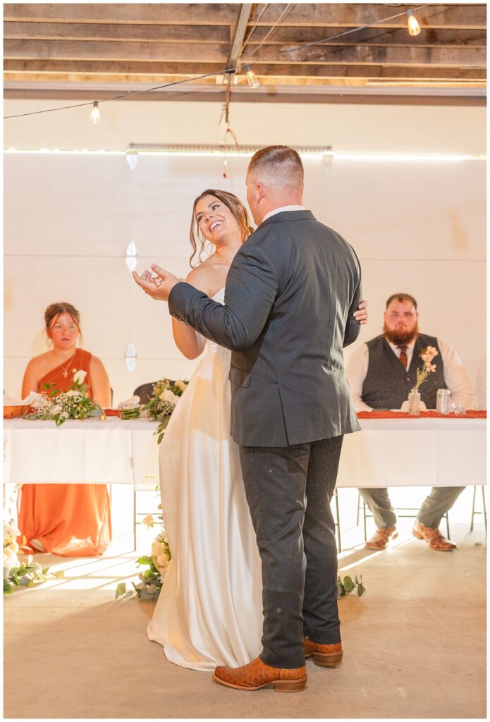 wedding couple sharing their first dance in the barn at the Octagon House in Tiffin, Ohio