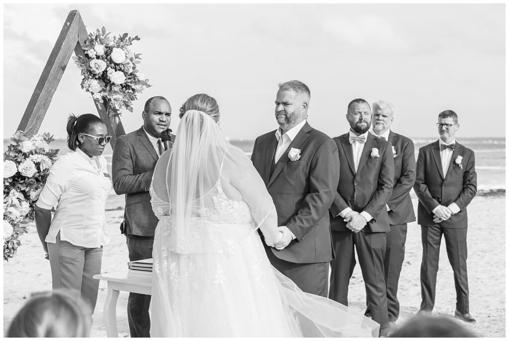 wedding couple saying their vows during beach ceremony at Punta Cana Dream Resort