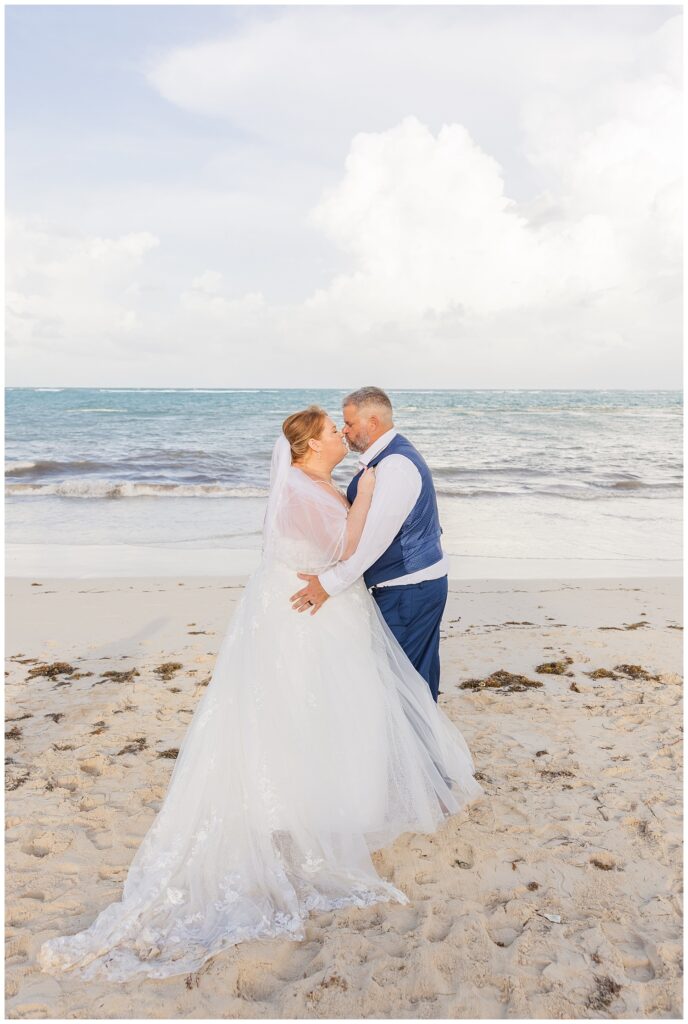Tiffin, Ohio wedding photographer posing the bride and groom for their celebration at Punta Cana Dream Resort