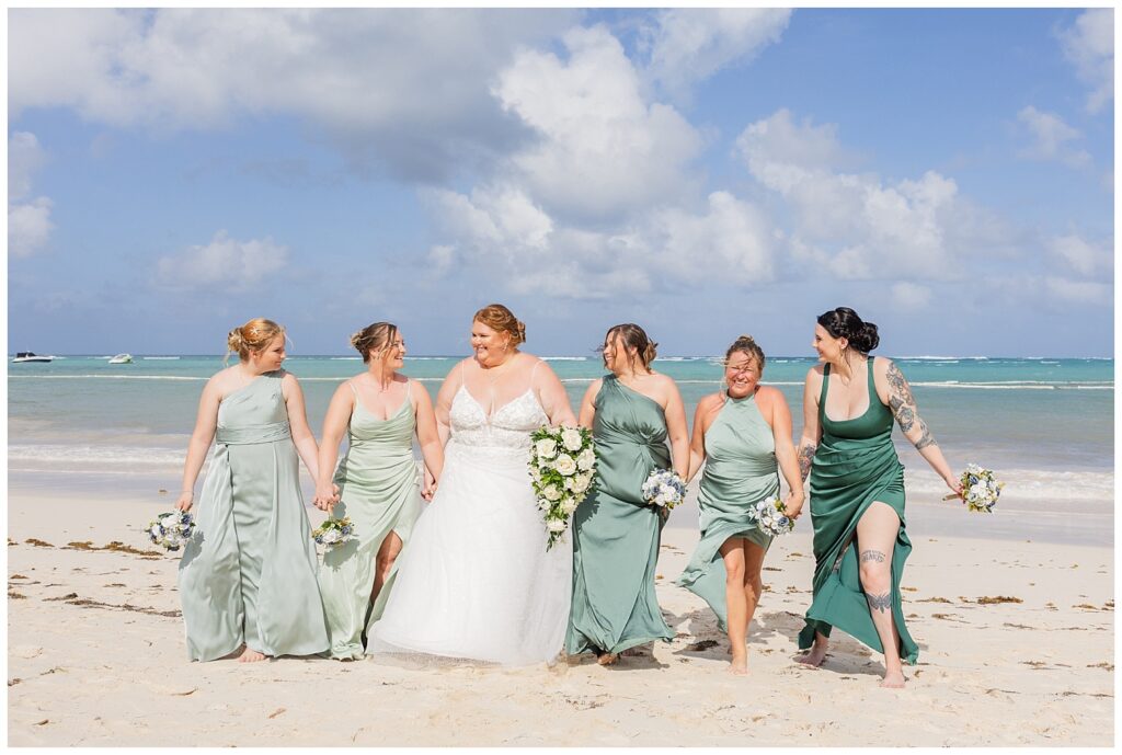 bridesmaids walking together on the beach for Punta Cana destination wedding