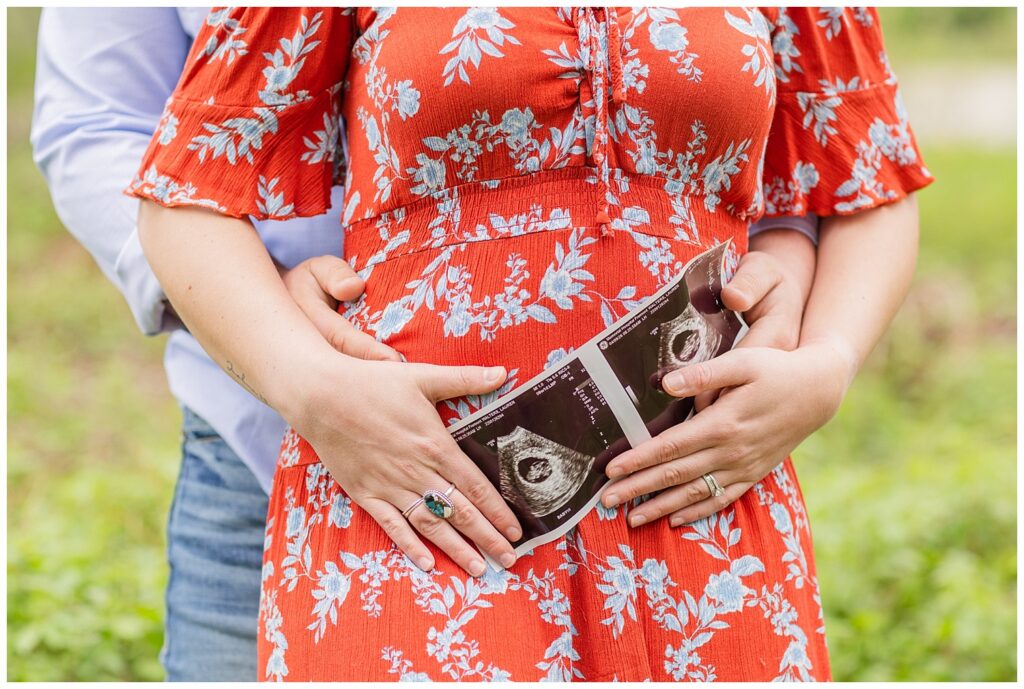 pregnancy announcement portrait session at Tindall Bridge with Fremont, Ohio photographer